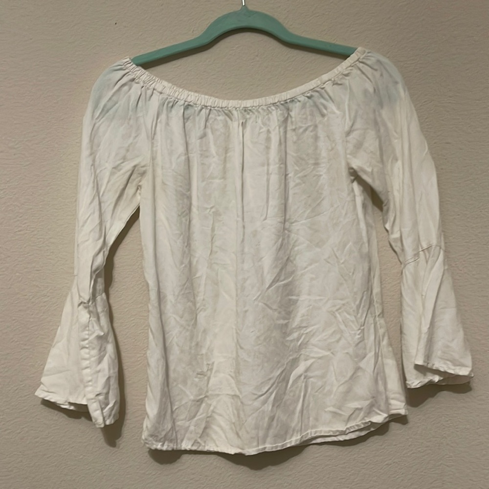 White small, good condition. Zipper on side